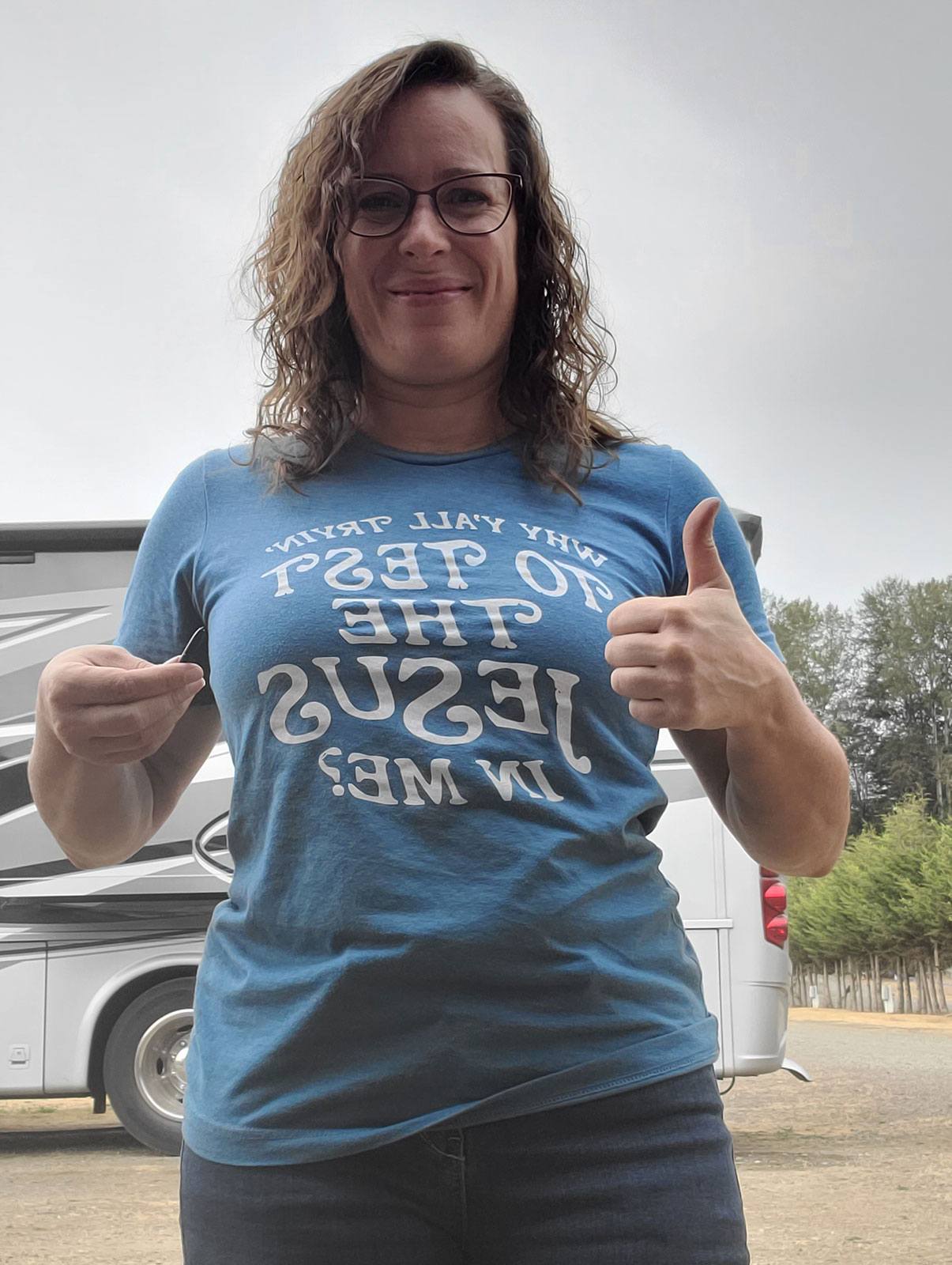 Wearing the shirt “why you all trying to test the Jesus in me.?”